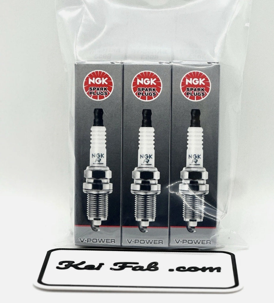 Three NGK V-Power spark plugs in packaging with a visible brand logo at the bottom.